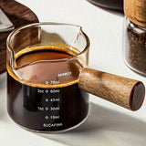 
  
  Double Shot Espresso Glass with Wood Handle - Double Spout for Precise Pouring, Measurement Marks - Perfect for Coffee Lovers & Baristas
  
